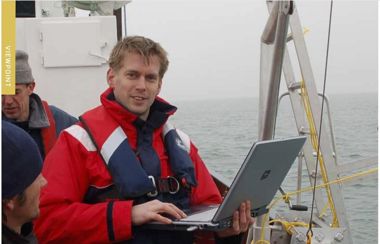 Mark Ybema working on deck at sea